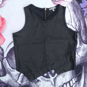 Black asymmetrical faux leather crop top